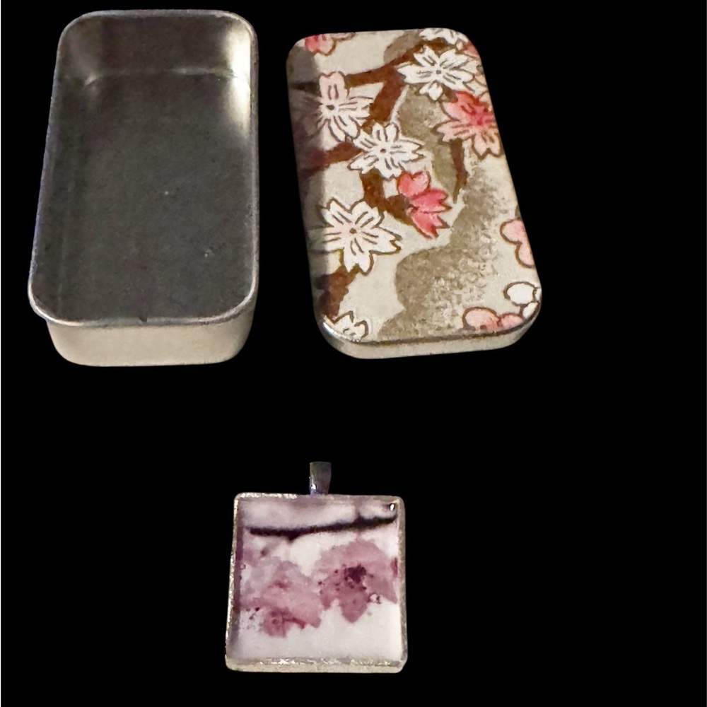 * Price Drop 
Floral Metal Tin with Pendant